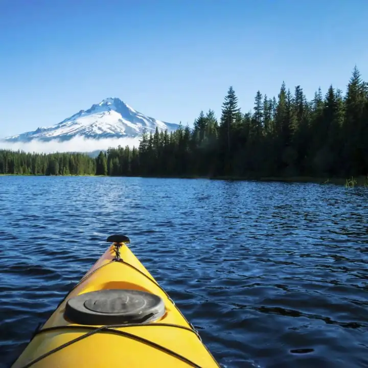 A kayak on a mountain lake.