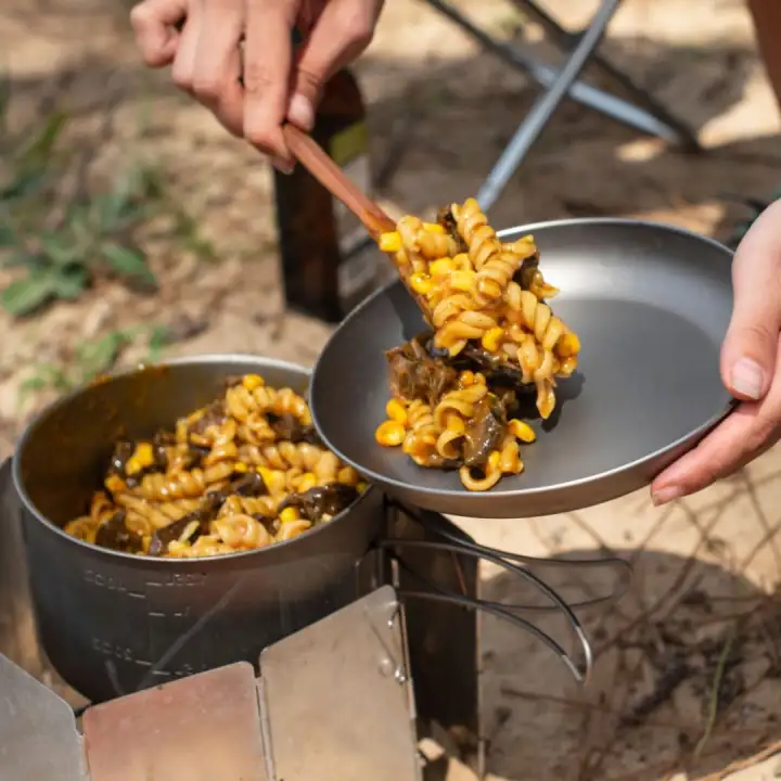 A camp meal being served.