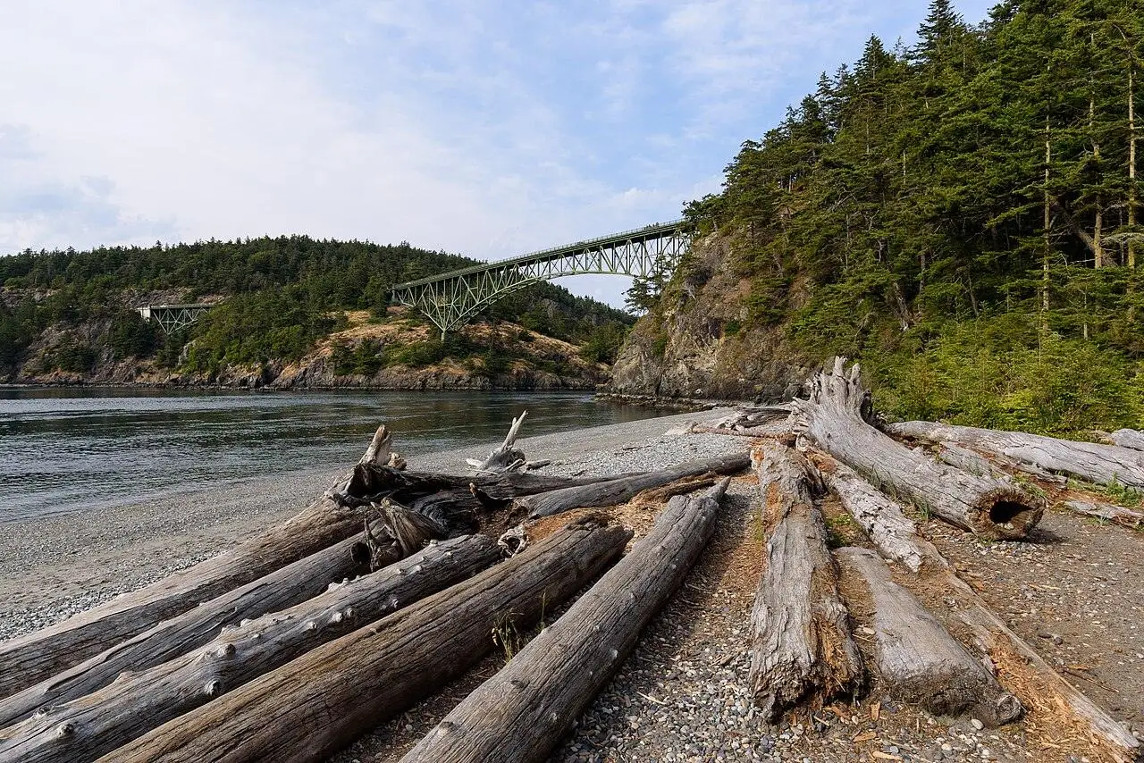 Deception Pass Bridge spanning the water, seen from the southwest.